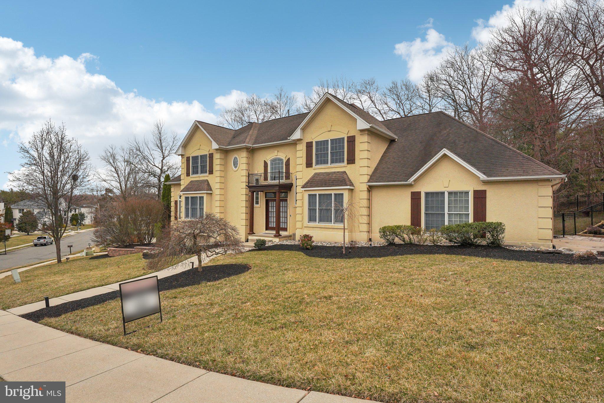 207 Summit Road Mount Laurel, NJ 08054 - Photo 4 of 57 a view of a white house with a yard and table and chairs