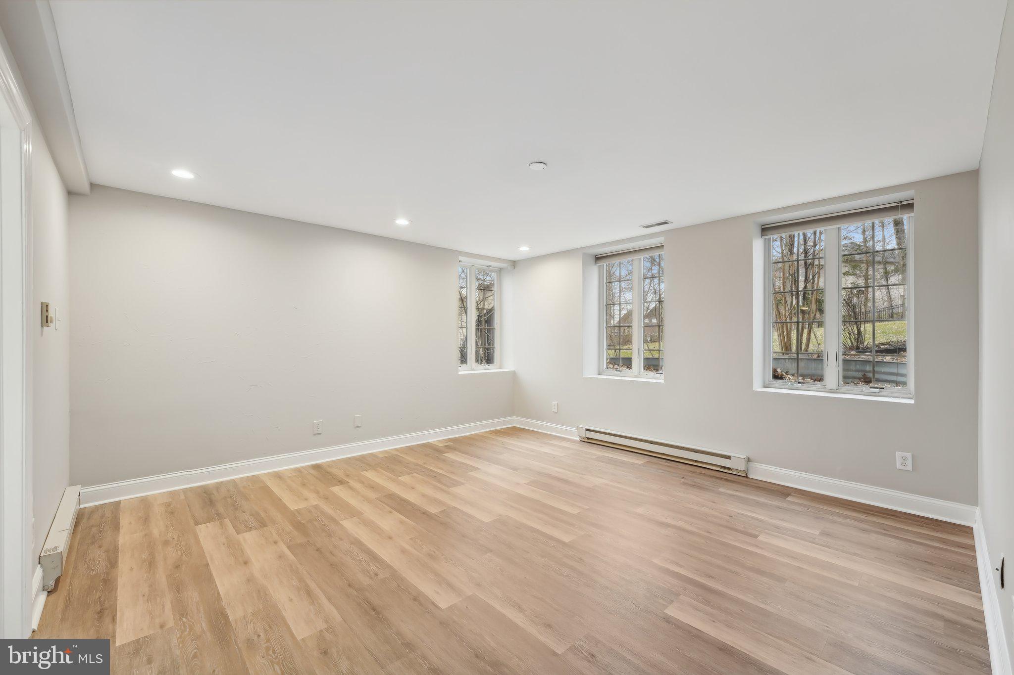207 Summit Road Mount Laurel, NJ 08054 - Photo 48 of 57 a view of an empty room with wooden floor and a window