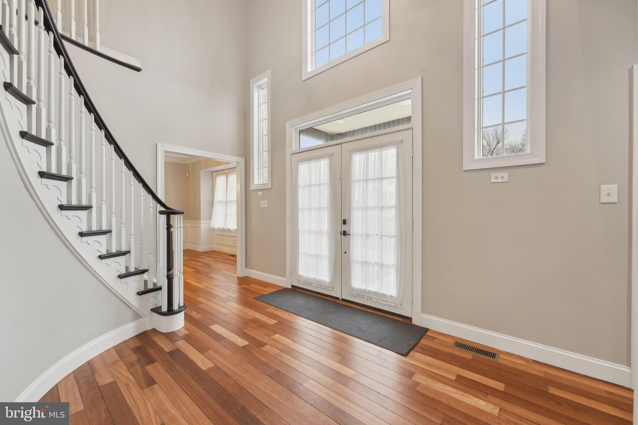 207 Summit Road Mount Laurel, NJ 08054 - Photo 8 of 57 an entryway space view with wooden floor and staircase