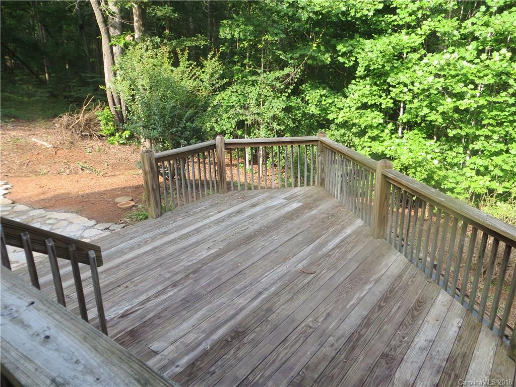 470 River Ridge Parkway Rutherfordton, NC 28139 - Photo 13 of 15 a balcony with wooden floor and yard in the back
