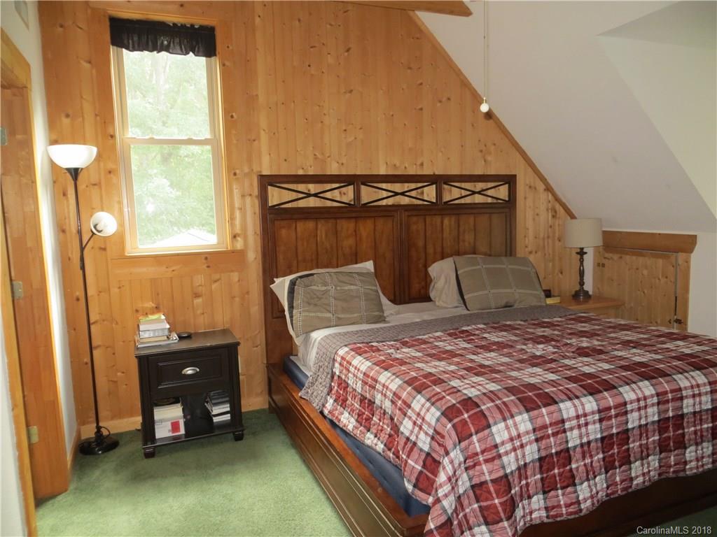 470 River Ridge Parkway Rutherfordton, NC 28139 - Photo 10 of 15 a bedroom with a bed and a window