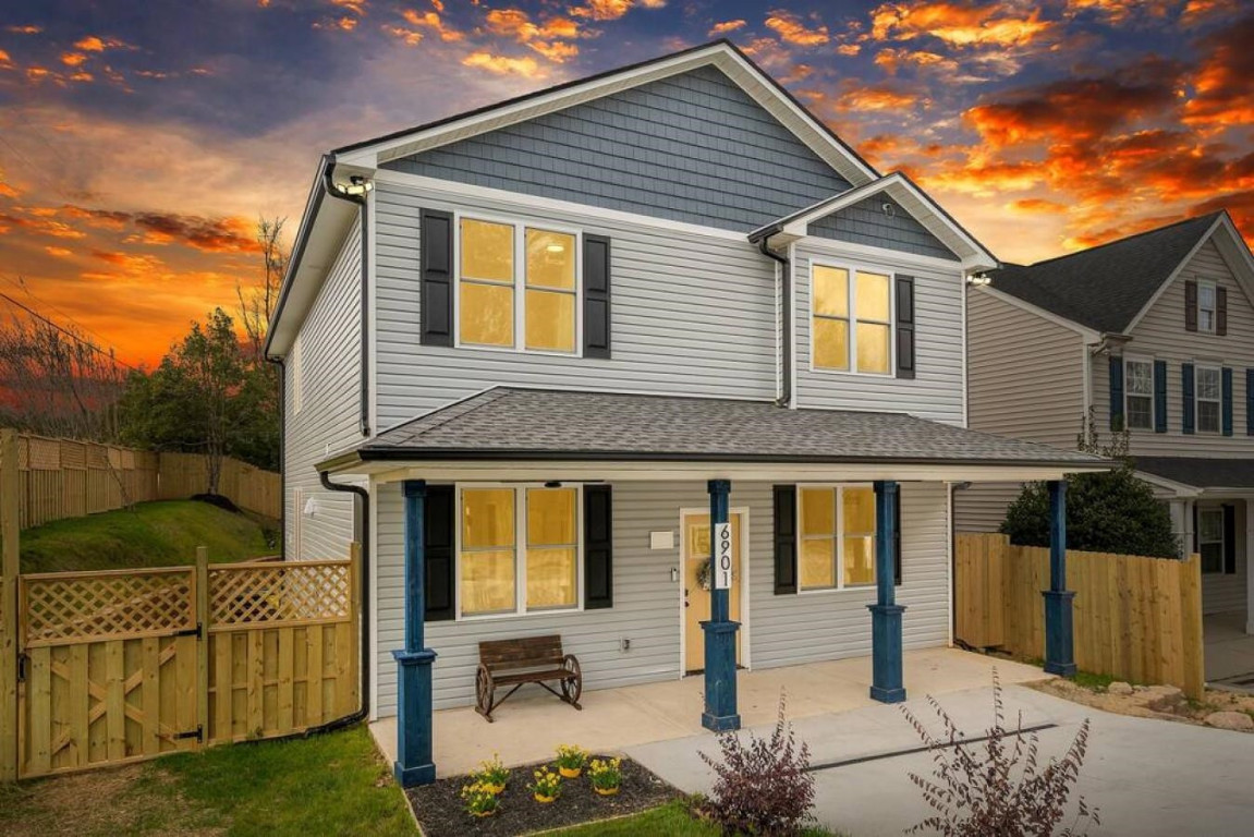 6901 Jeffreys Creek Lane Raleigh, NC 27616 - Photo 1 of 37 a front view of a house with yard