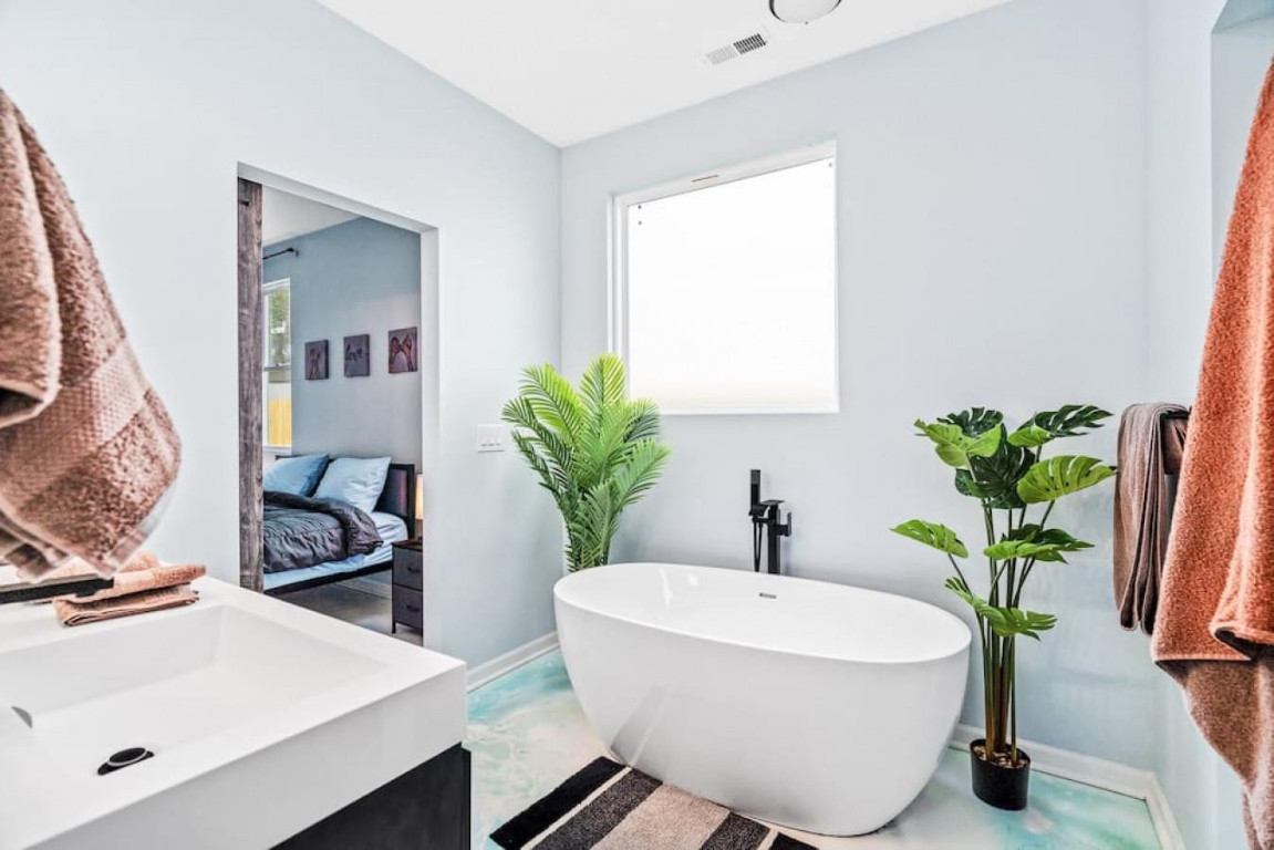 6901 Jeffreys Creek Lane Raleigh, NC 27616 - Photo 14 of 37 a white bath tub sitting next to a white sink