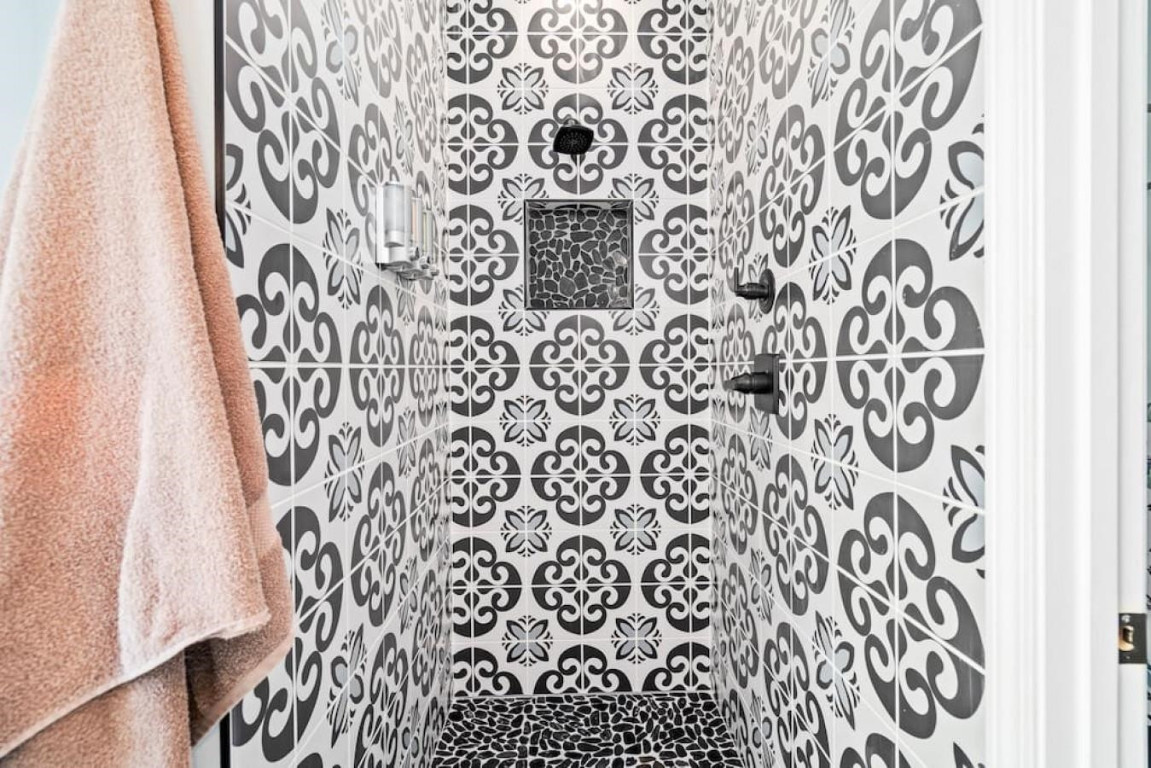 6901 Jeffreys Creek Lane Raleigh, NC 27616 - Photo 17 of 37 a bathroom with a shower curtain