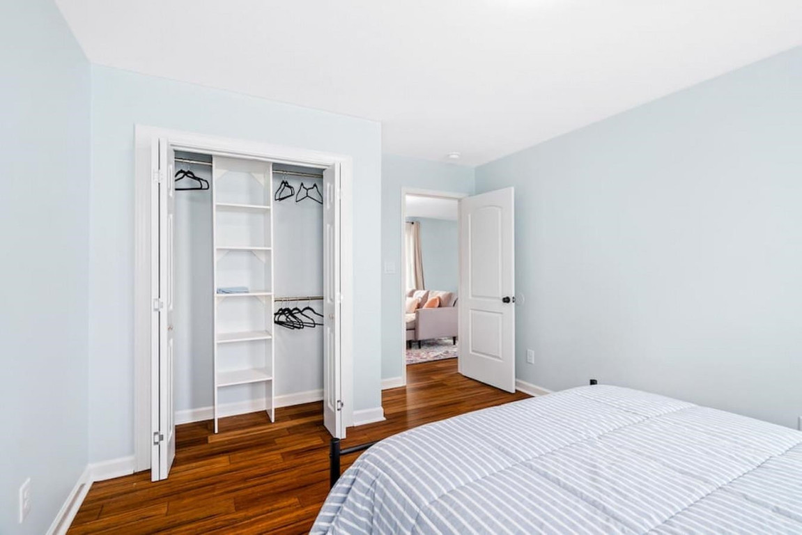 6901 Jeffreys Creek Lane Raleigh, NC 27616 - Photo 20 of 37 a bedroom with a bed and a table