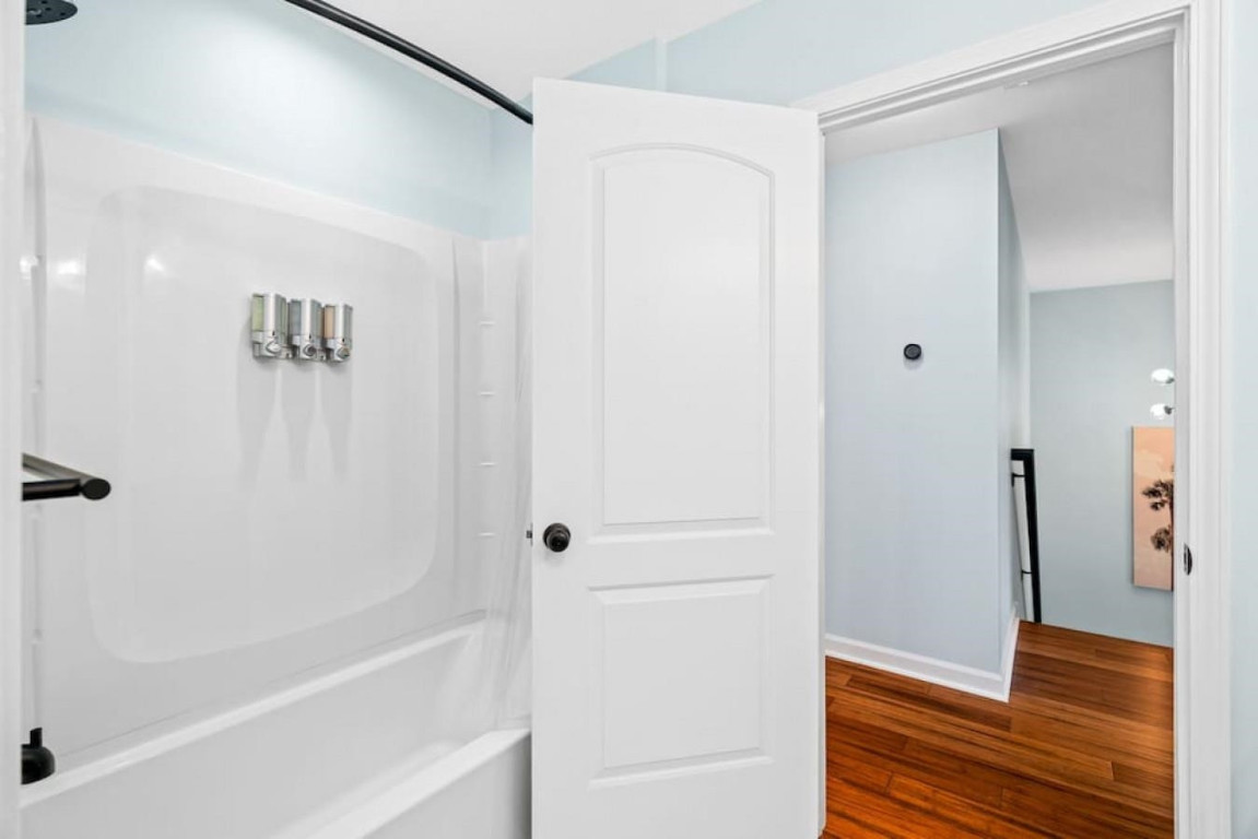 6901 Jeffreys Creek Lane Raleigh, NC 27616 - Photo 21 of 37 a bathroom with a bathtub and a shower