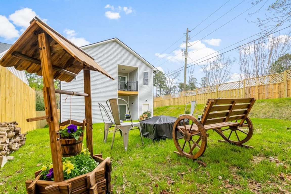 6901 Jeffreys Creek Lane Raleigh, NC 27616 - Photo 32 of 37 a view of an chairs and table in the patio