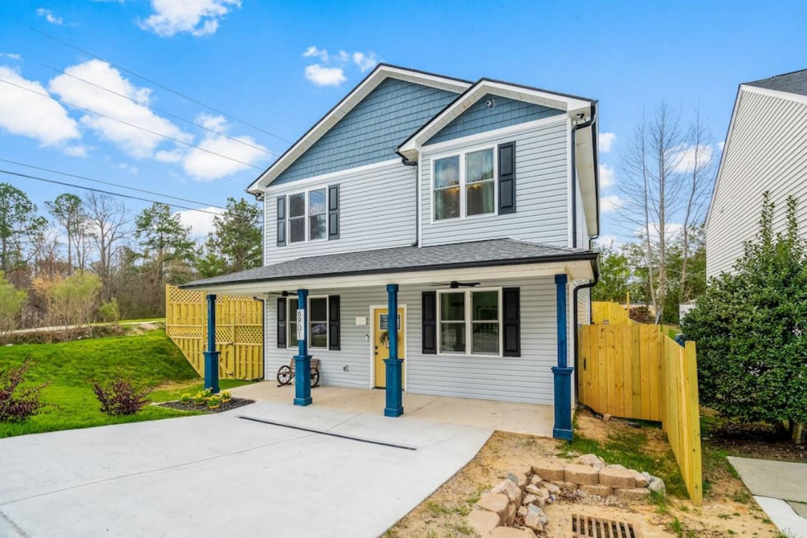 6901 Jeffreys Creek Lane Raleigh, NC 27616 - Photo 33 of 37 a front view of a house with a garden
