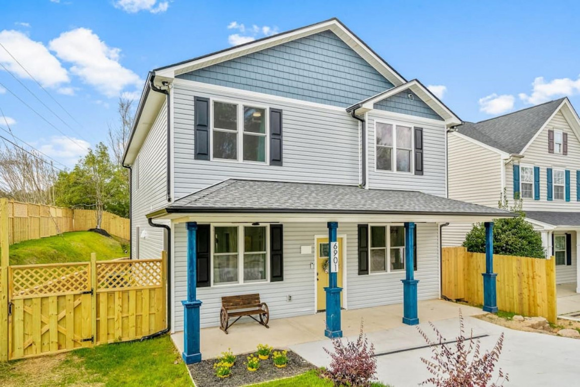 6901 Jeffreys Creek Lane Raleigh, NC 27616 - Photo 34 of 37 a front view of a house with a yard