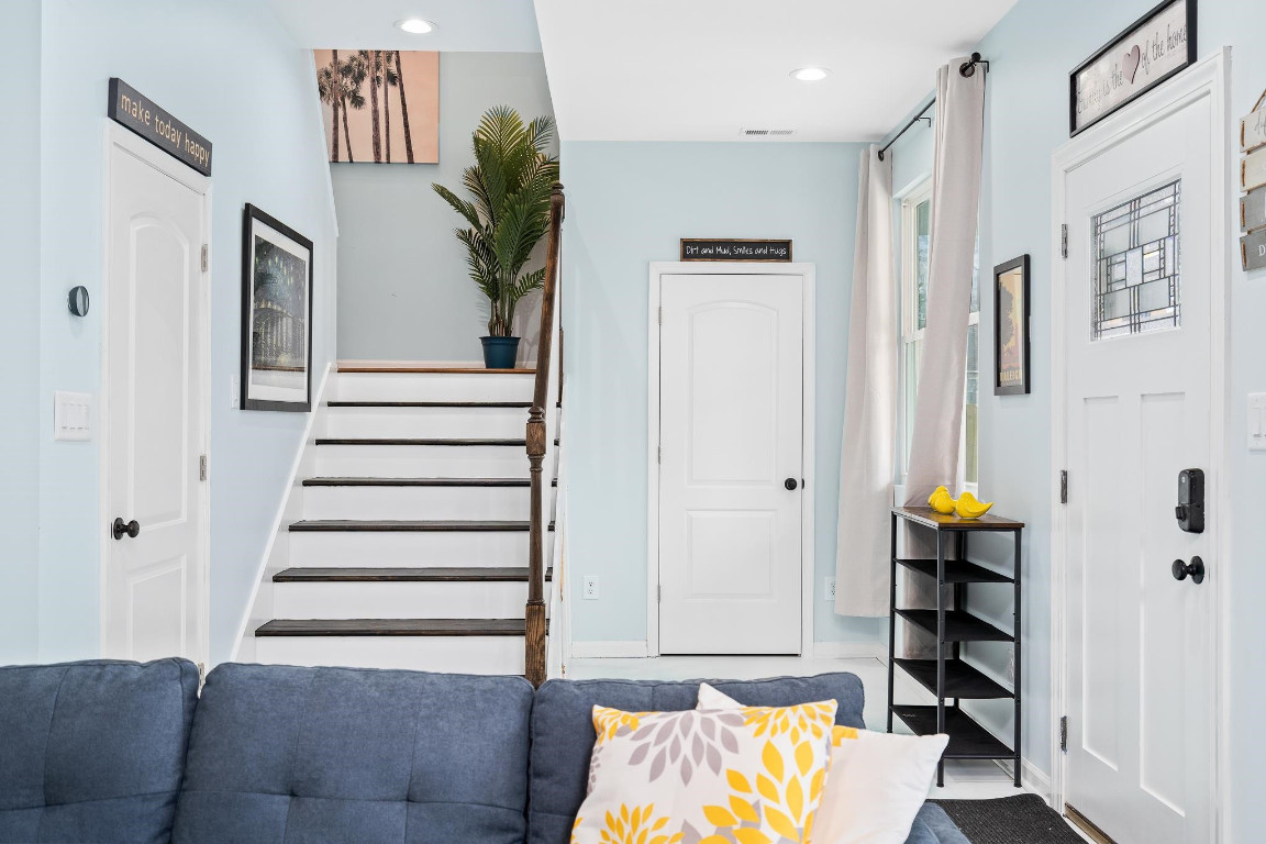 6901 Jeffreys Creek Lane Raleigh, NC 27616 - Photo 4 of 37 a view of hallway with furniture and window