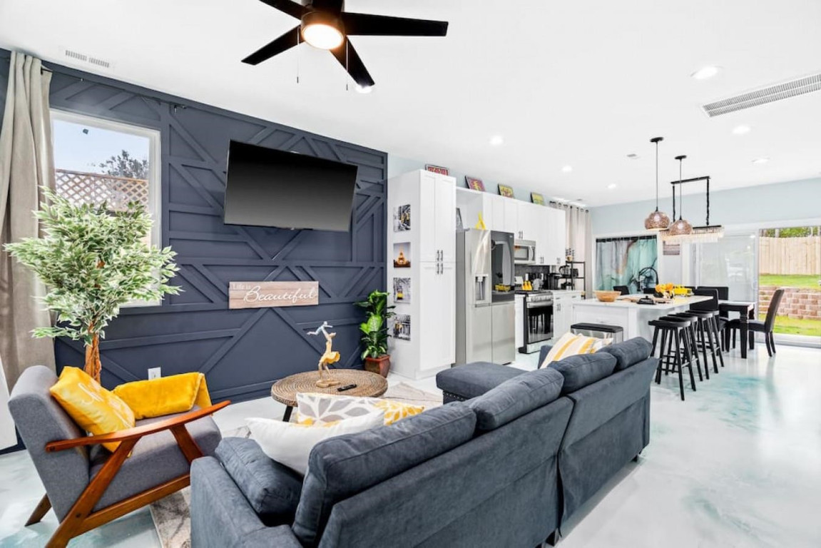 6901 Jeffreys Creek Lane Raleigh, NC 27616 - Photo 5 of 37 a living room with furniture and a view of kitchen
