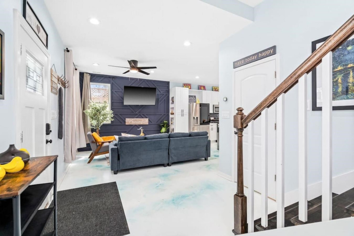 6901 Jeffreys Creek Lane Raleigh, NC 27616 - Photo 7 of 37 a living room with furniture and a fireplace