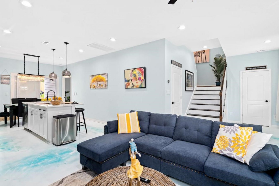 6901 Jeffreys Creek Lane Raleigh, NC 27616 - Photo 10 of 37 a living room with furniture and kitchen view