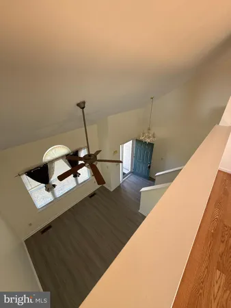 a view of workspace with wooden floor