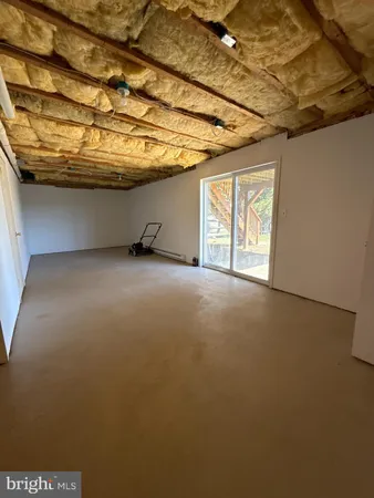 a view of a room with windows