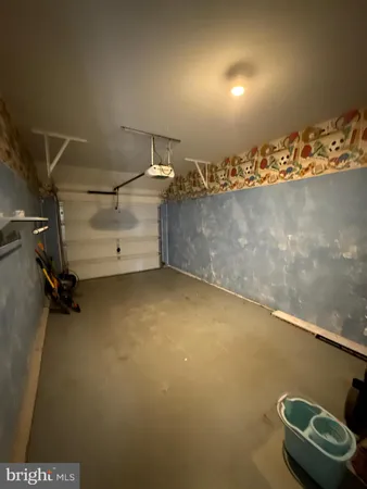 an empty room with a wooden floor