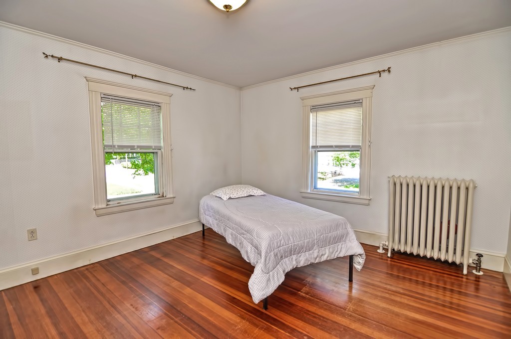 175 Union Street Walpole, MA 02032 - Photo 13 of 29 a bedroom with a bed and a window