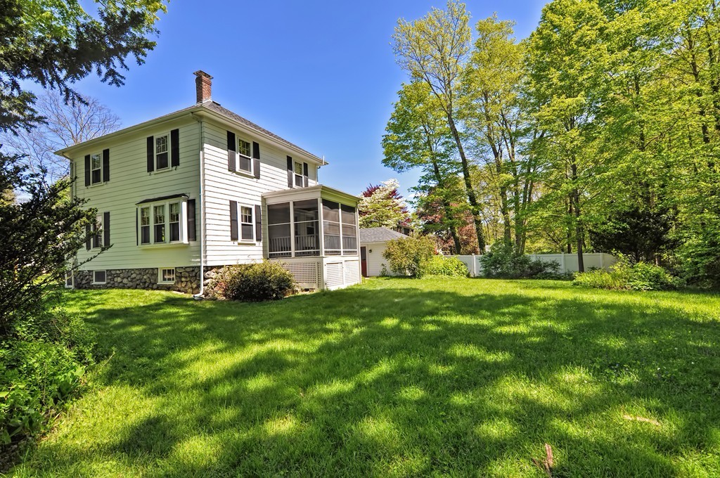 175 Union Street Walpole, MA 02032 - Photo 2 of 29 a front view of a house with a yard