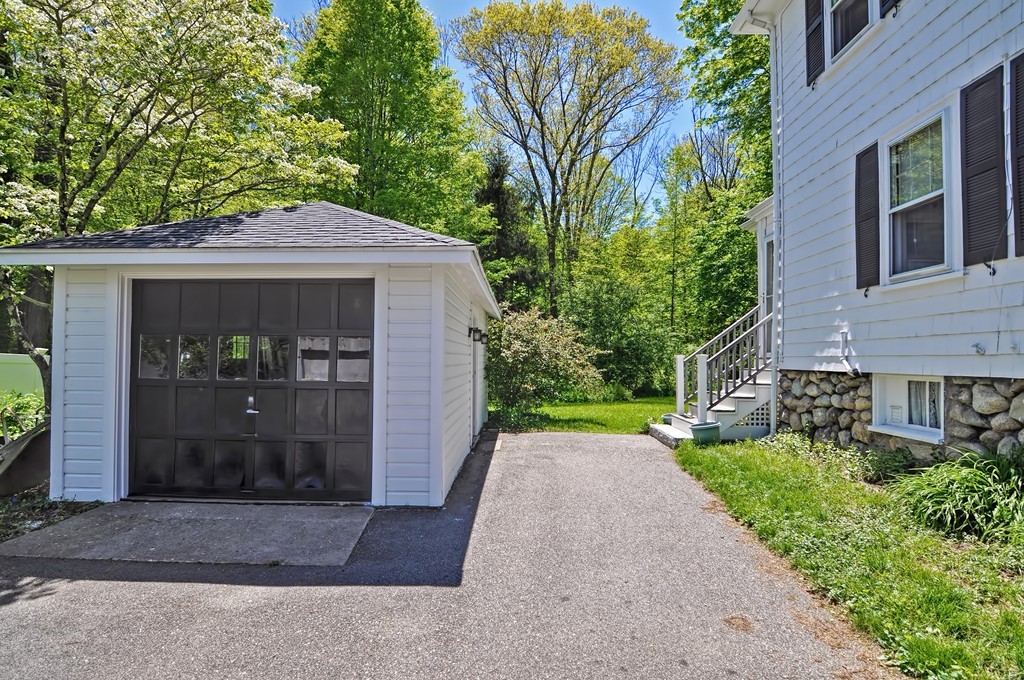 175 Union Street Walpole, MA 02032 - Photo 21 of 29 a front view of a house with garden