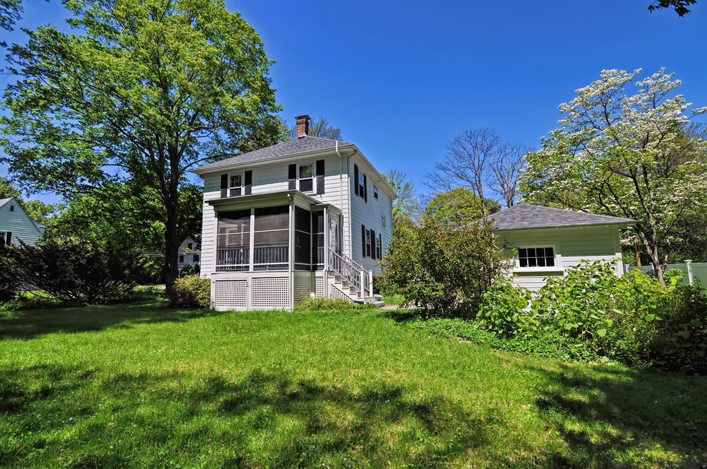 175 Union Street Walpole, MA 02032 - Photo 22 of 29 a front view of house with yard and green space