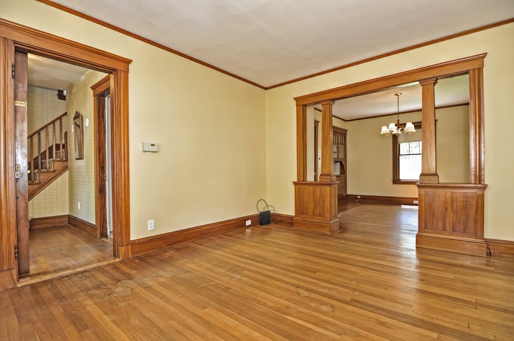 175 Union Street Walpole, MA 02032 - Photo 9 of 29 a view of a big room with wooden floor and way to kitchen