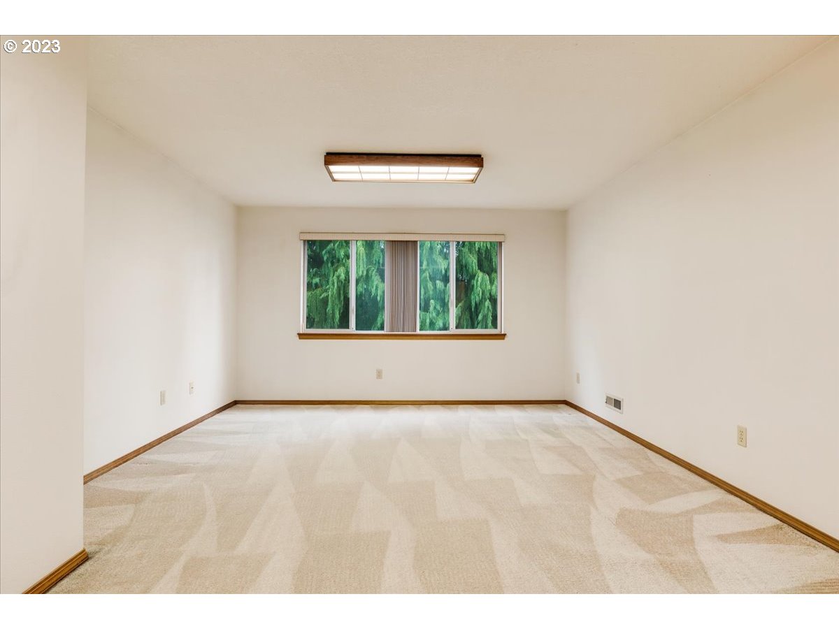 1502 Southeast Elliott Avenue Gresham, OR 97080 - Photo 29 of 37 a view of an empty room with a window