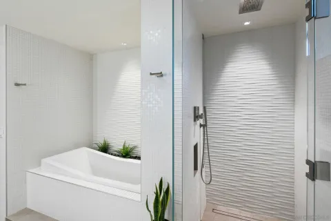 a spacious bathroom with a sink and a mirror