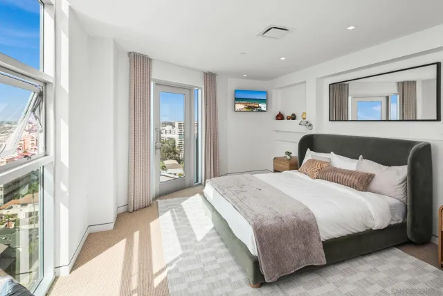 a bathroom with a double vanity sink and mirror
