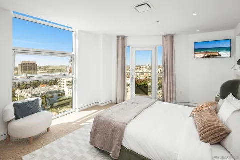 a table with a vase and flowers on it