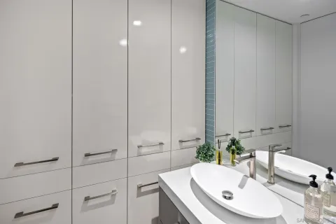 a view of a balcony with an outdoor seating