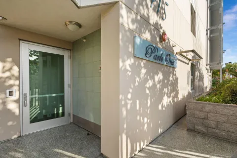 a view of a balcony with chairs