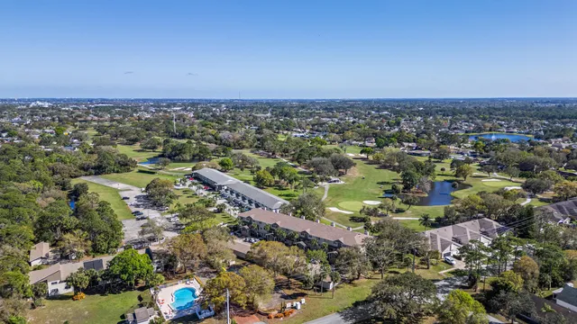 an aerial view of a city with lots of residential buildings