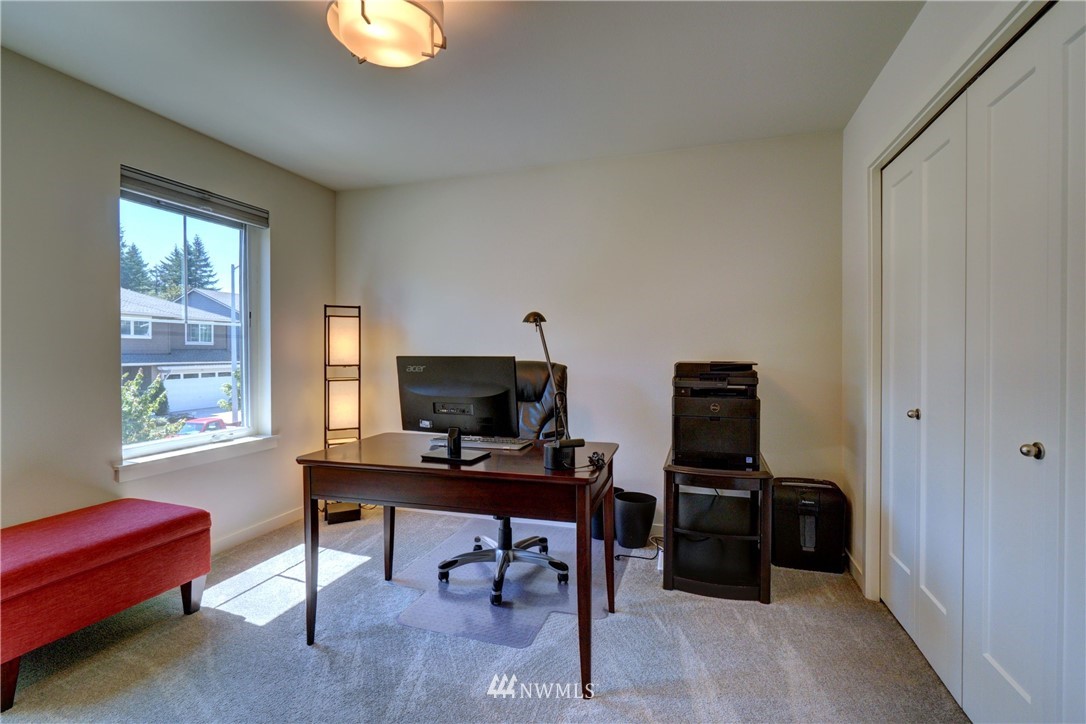 15 175th Place Southwest Bothell, WA 98012 - Photo 23 of 40 a view of a workspace with furniture and a window