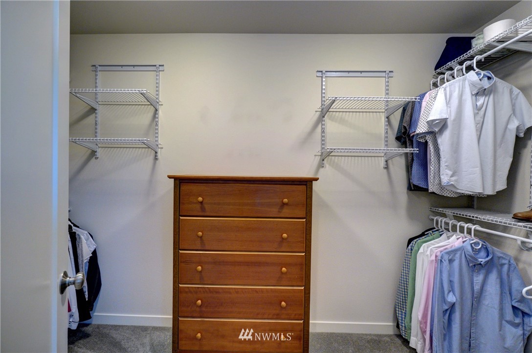 15 175th Place Southwest Bothell, WA 98012 - Photo 33 of 40 a view of walk in closet with clothes and shoes