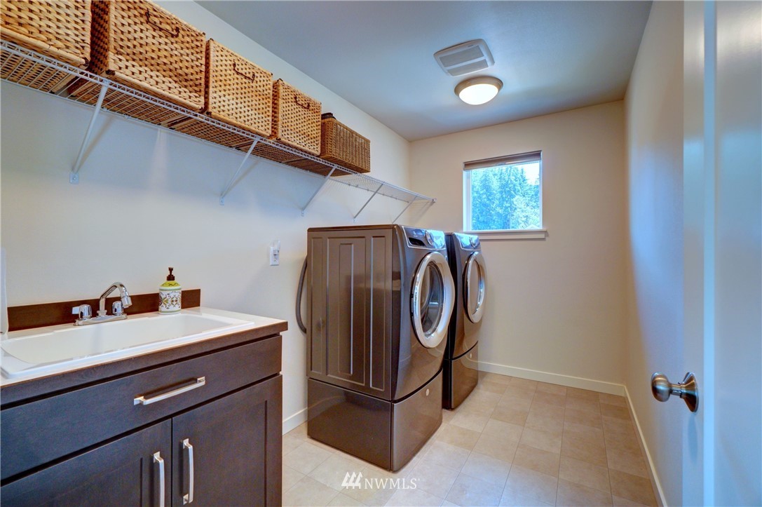 15 175th Place Southwest Bothell, WA 98012 - Photo 34 of 40 a utility room with dryer and washer