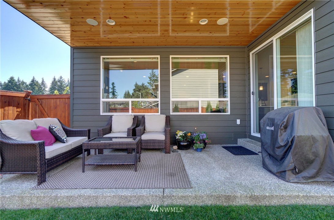 15 175th Place Southwest Bothell, WA 98012 - Photo 35 of 40 a view of a patio with couches chairs and a potted plant