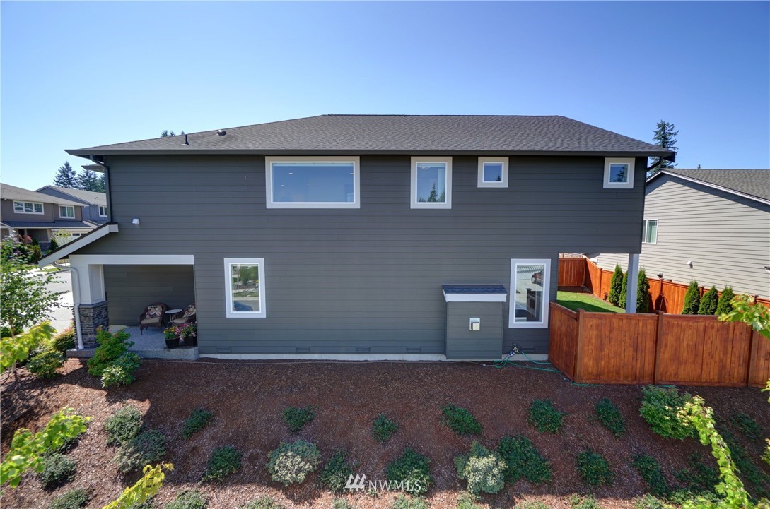 15 175th Place Southwest Bothell, WA 98012 - Photo 38 of 40 a backyard of a house with lots of green space and plants