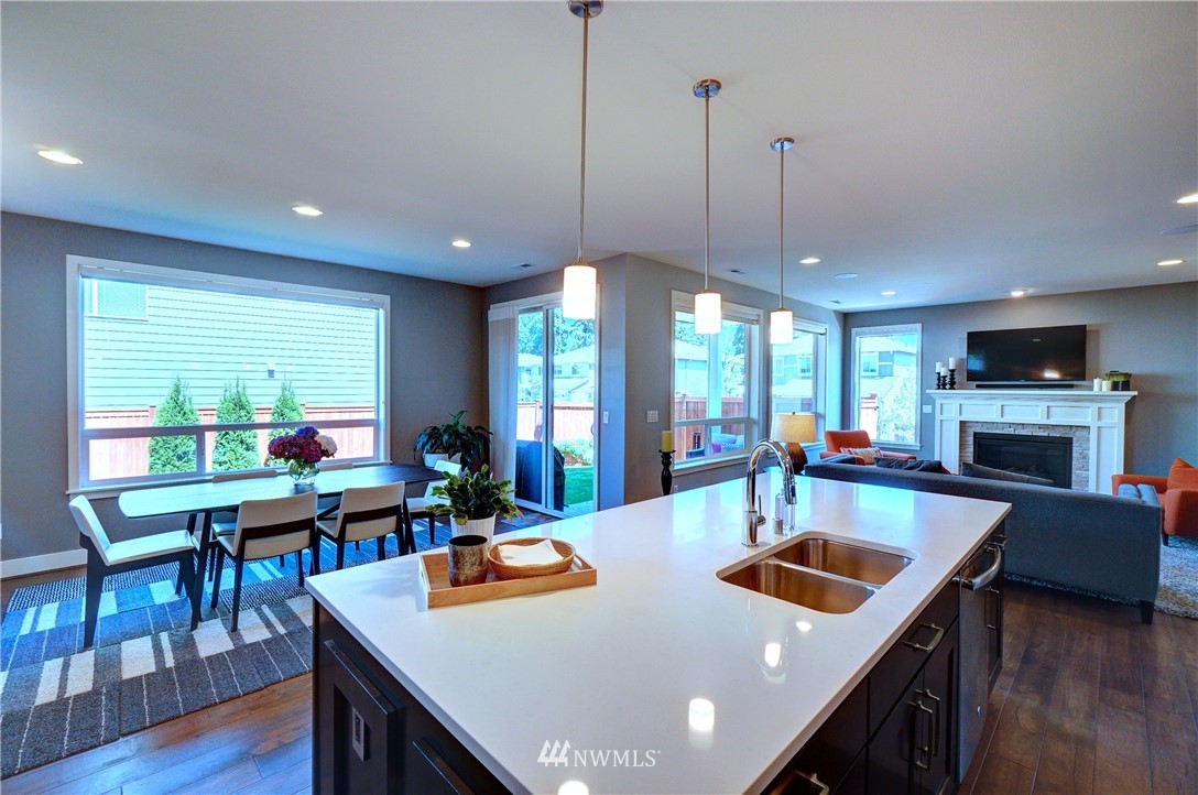 15 175th Place Southwest Bothell, WA 98012 - Photo 5 of 40 a view of a dining room with furniture window and wooden floor