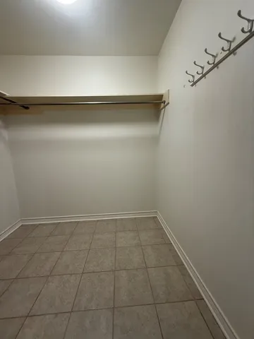 a view of a room with racks on the wall