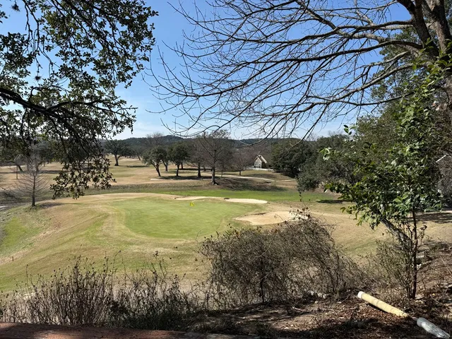 a view of a swimming pool with an outdoor space