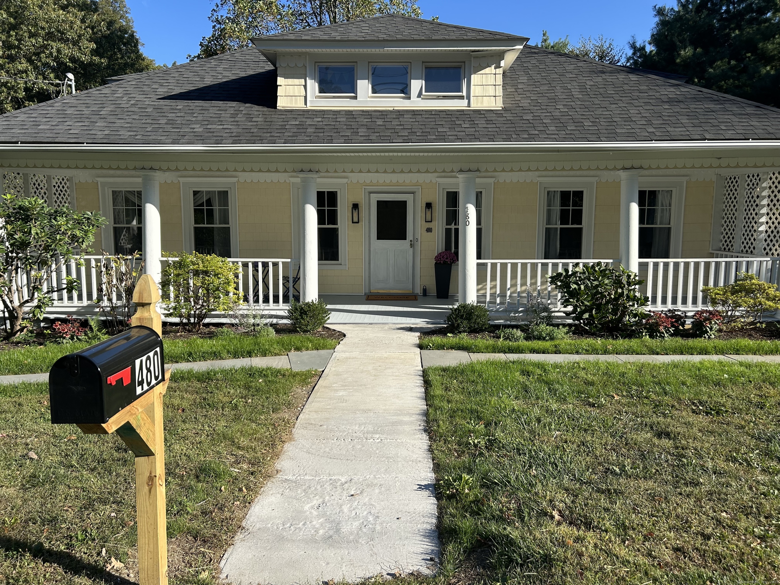 front view of house with a yard