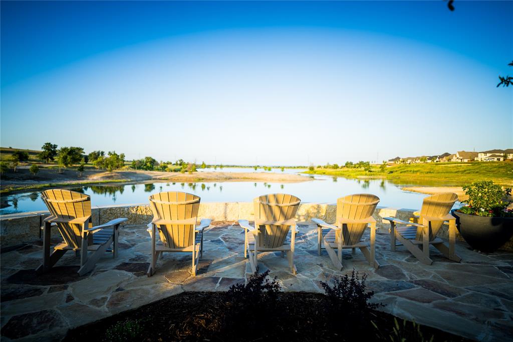 179 Summer Rain Way Rhome, TX 76078 - Photo 23 of 26 a view of a lake with boats and trees