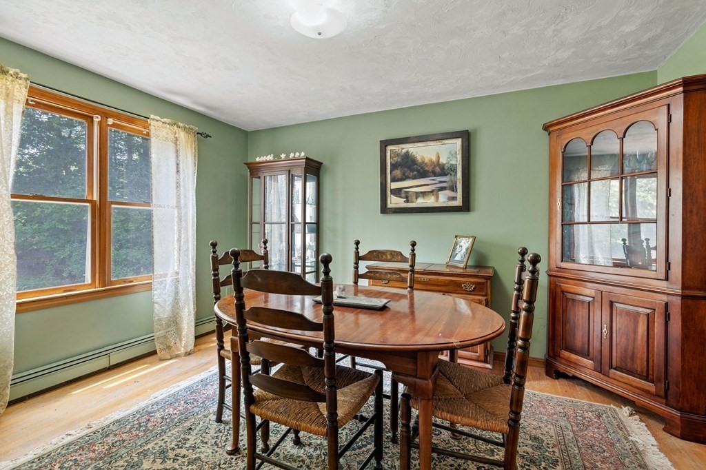 44 Smith Road Mansfield, MA 02048 - Photo 13 of 21 a view of a dining room with furniture window and outside view