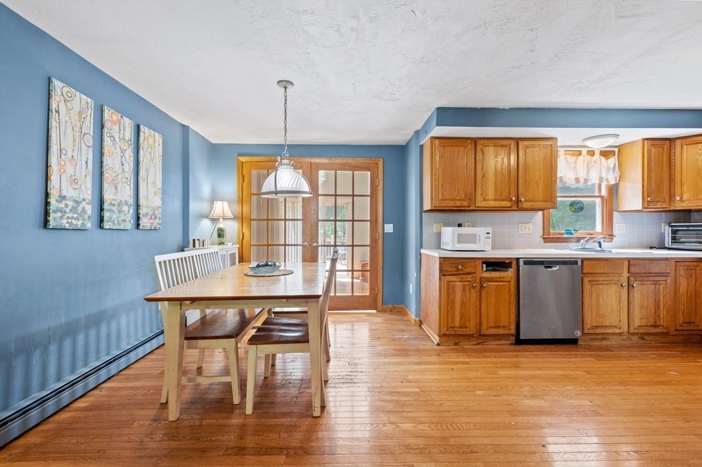 44 Smith Road Mansfield, MA 02048 - Photo 7 of 21 a view of a dining room with furniture window and wooden floor