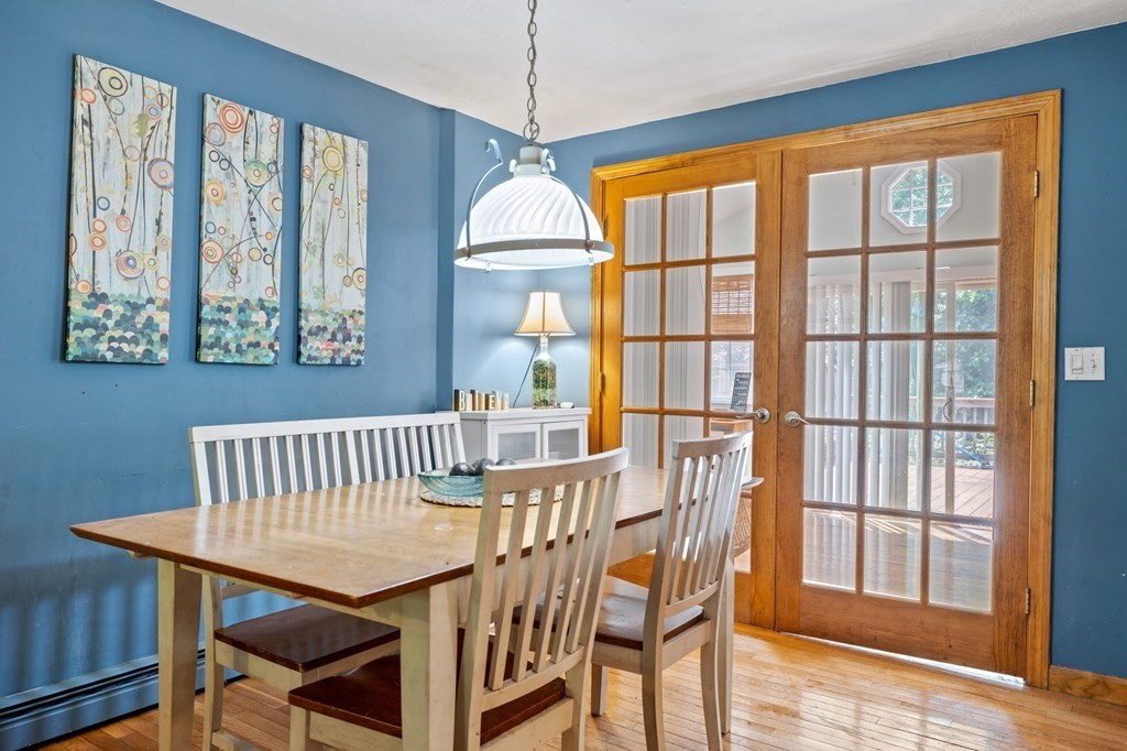 44 Smith Road Mansfield, MA 02048 - Photo 9 of 21 a view of a dining room with furniture window and wooden floor