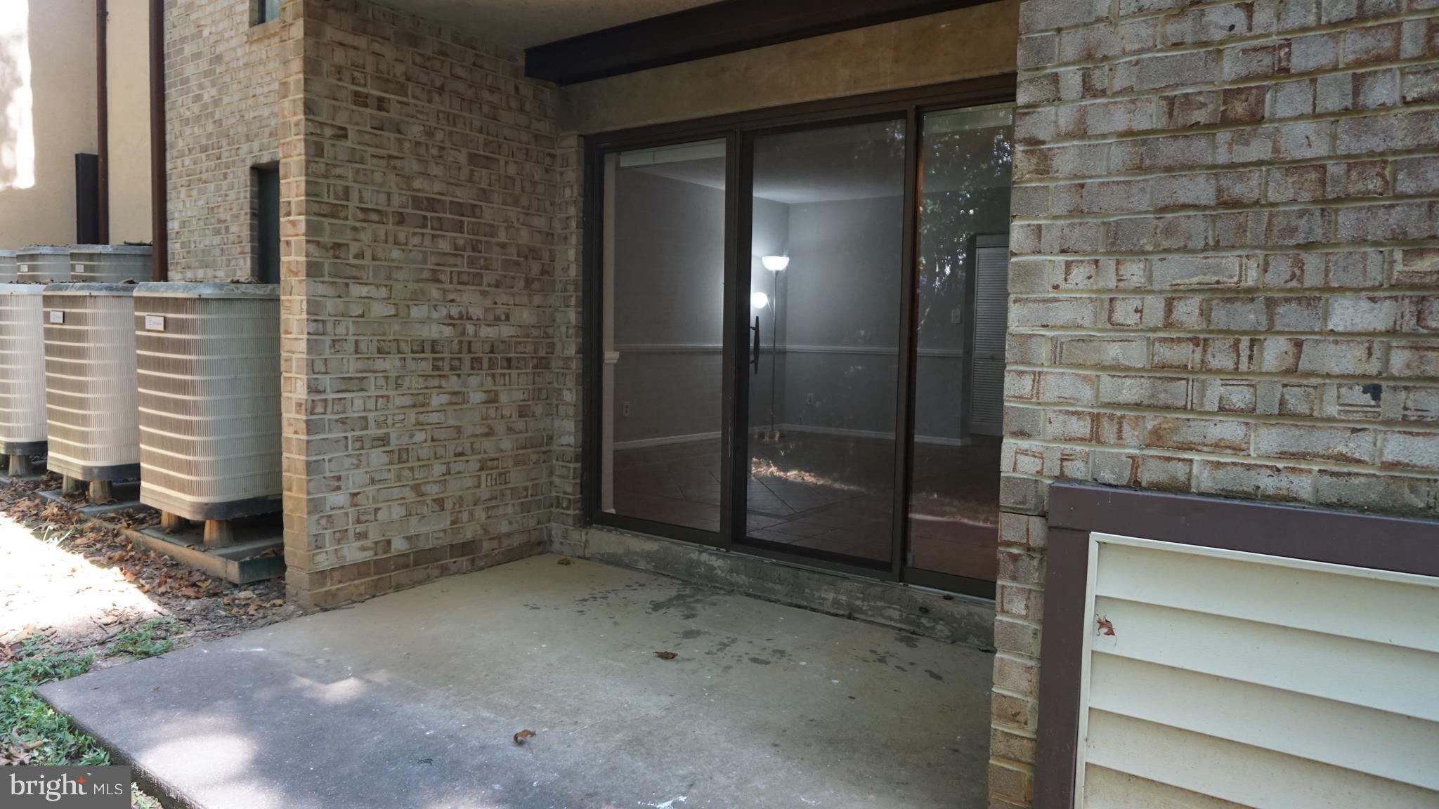 2214 Castle Rock Square, Unit 2B Reston, VA 20191 - Photo 24 of 26 Ground Level Porch with View of Trees