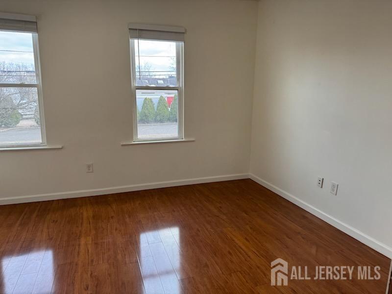 721 Lincoln Boulevard Middlesex, NJ 08846 - Photo 5 of 11 an empty room with a window