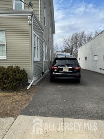 721 Lincoln Boulevard Middlesex, NJ 08846 - Photo 7 of 11 a car parked in front of a house