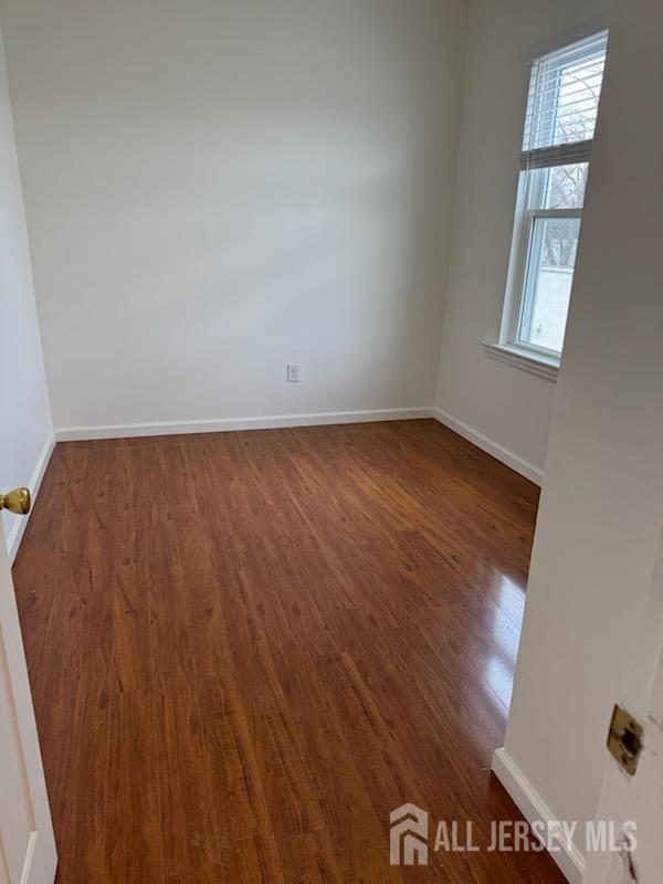 721 Lincoln Boulevard Middlesex, NJ 08846 - Photo 9 of 11 an empty room with windows