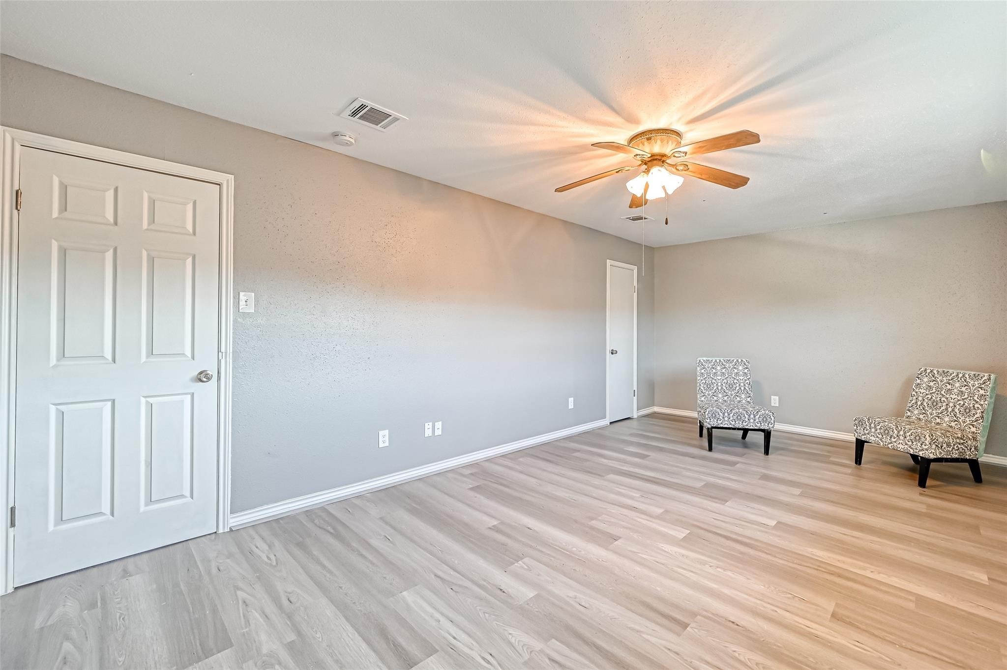 10252 Cottage Field Road Houston, TX 77041 - Photo 6 of 18 a bedroom with a bed and a chandelier